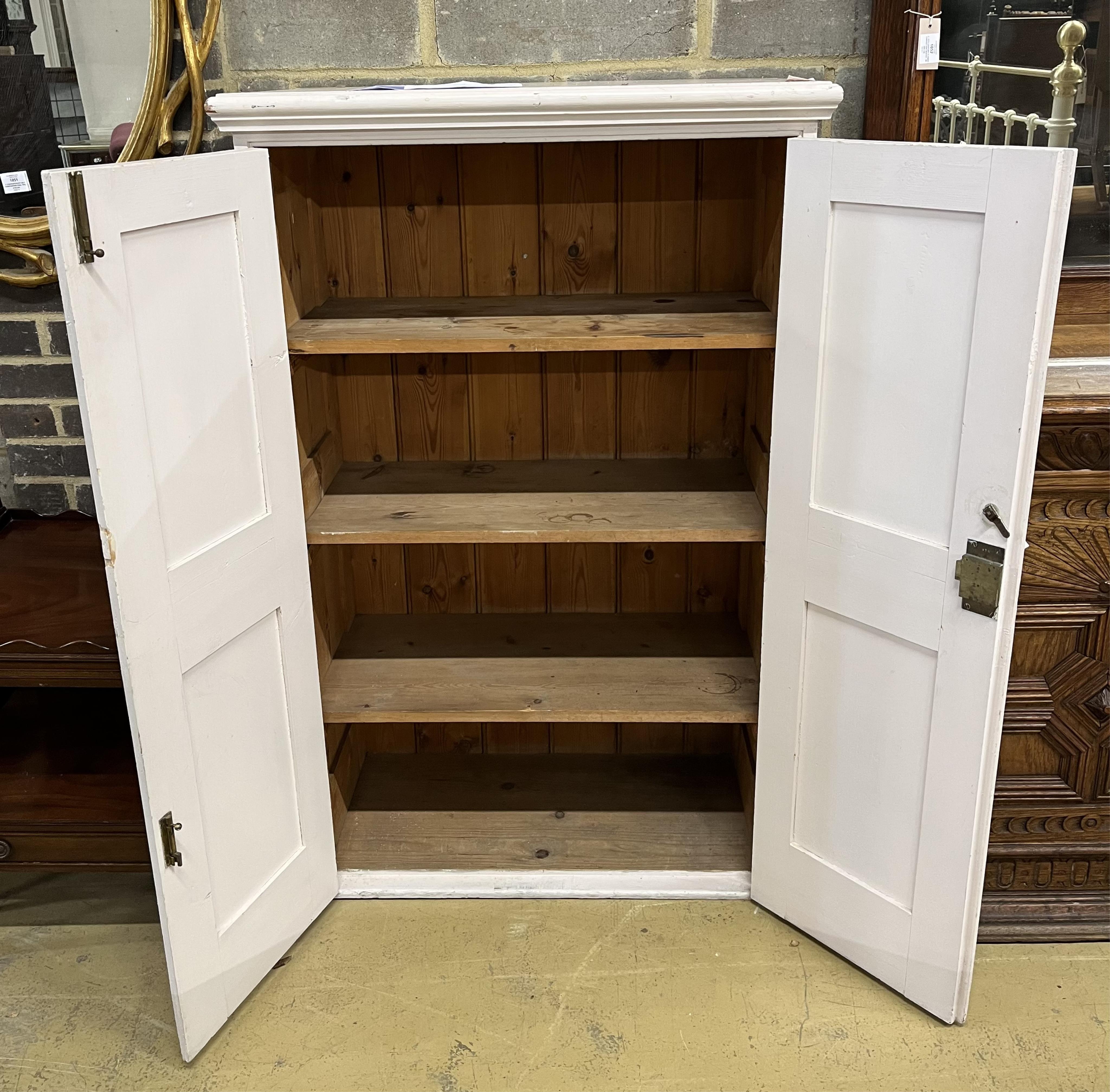 A Victorian painted pine panelled cupboard the interior with three shelves, width 86cm, depth 43cm, height 135cm. Condition - fair